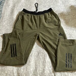 Adidas men’s medium athletic warm-up pants.
